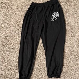ROMWE Black Joggers with White Skeleton Design